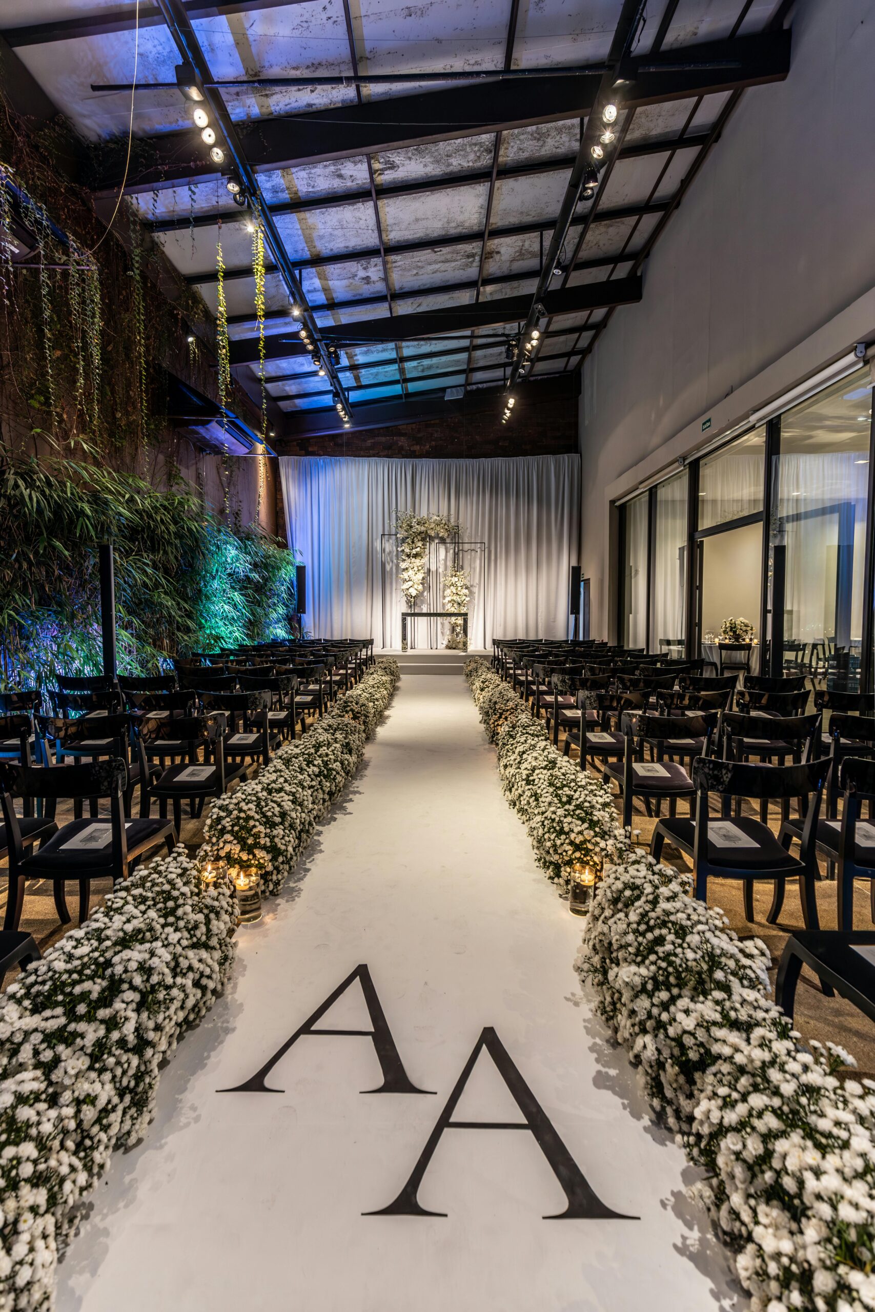 A Church decorated for a wedding with beautiful white flowers