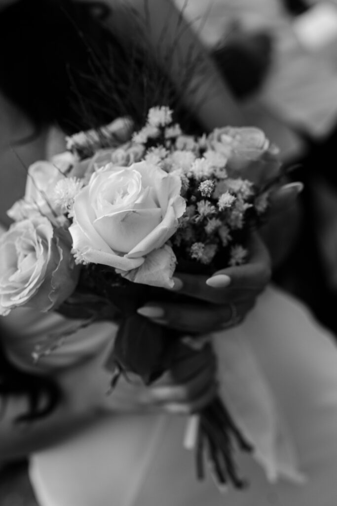 A bride holding wedding flowers