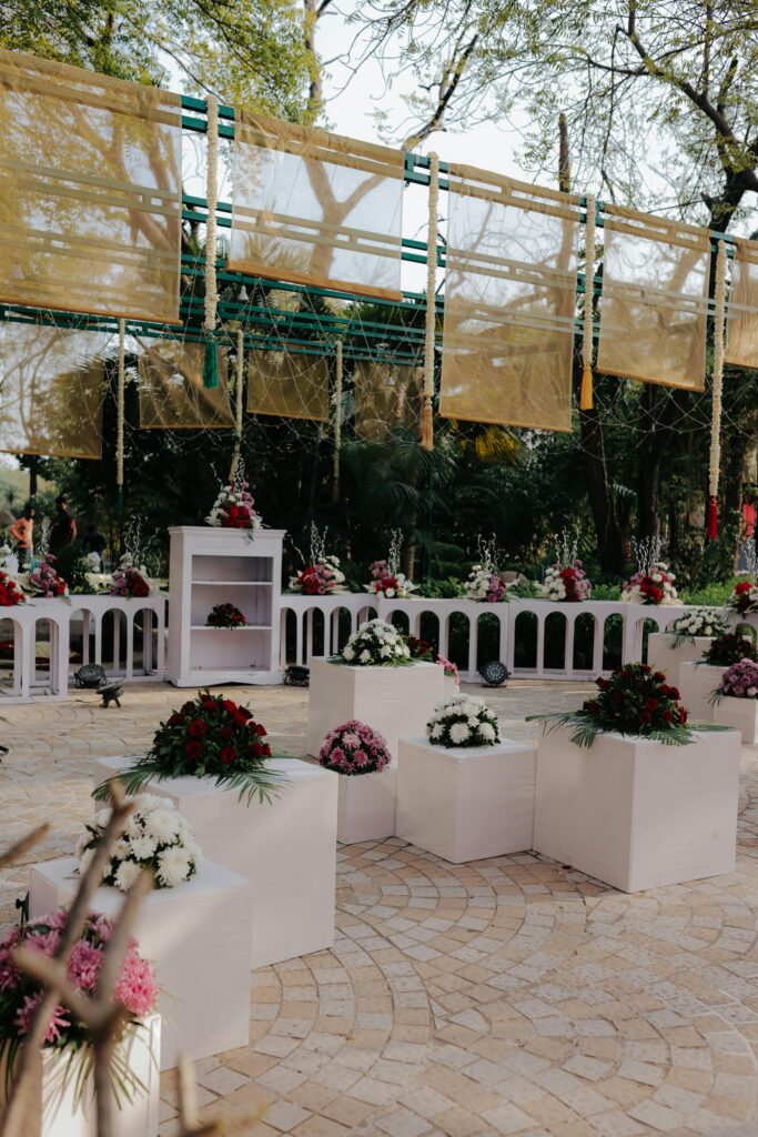  Fower arrangement in a white wedding setting 